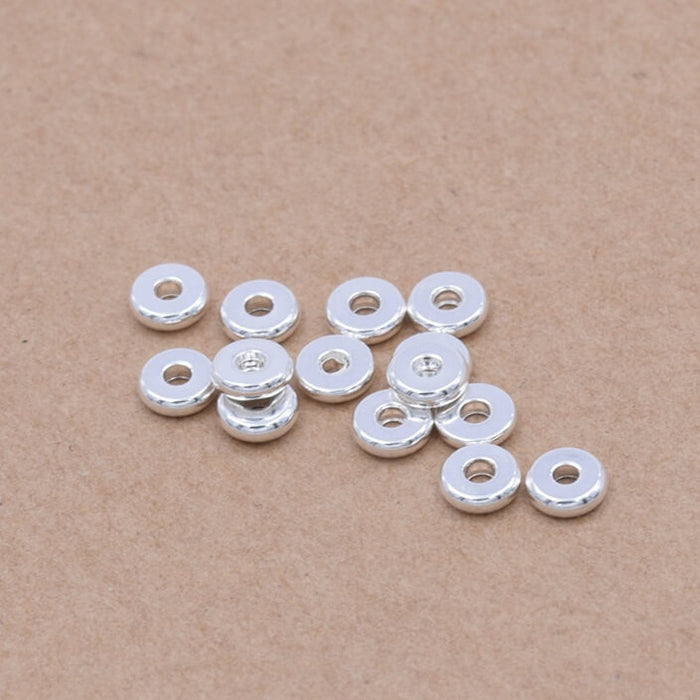 Heishi spacer beads in stainless steel Silver plated 4x1.2mm - Hole: 1.2mm (10)