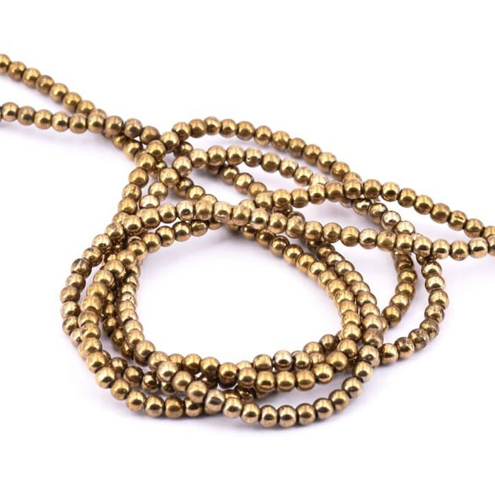 Round glass bead 2mm bronze gold - Hole: 0.6mm (1 strand = 35cm)