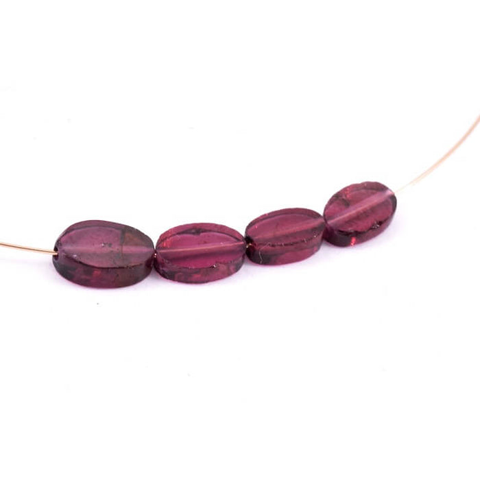 Flat oval bead Garnet - 7x5mm - Hole: 0.5mm (4)