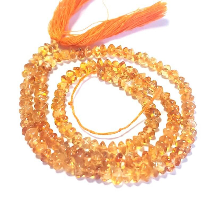 Citrine button bead 5-6x2-3mm - Hole: 0.5mm (1 Strand-35cm)