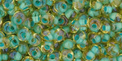 cc952 - Toho magatama beads 3mm rainbow light topaz/sea foam lined (10g)