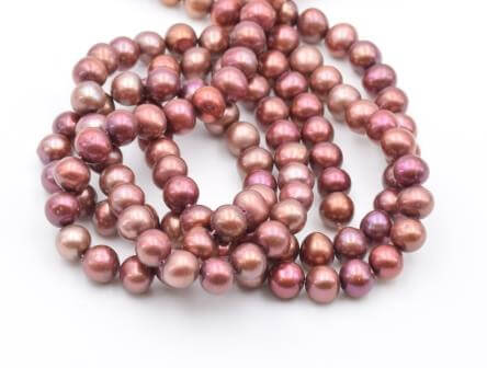 Freshwater pearls potato round metallic Bronze pink 6.5mm (1)