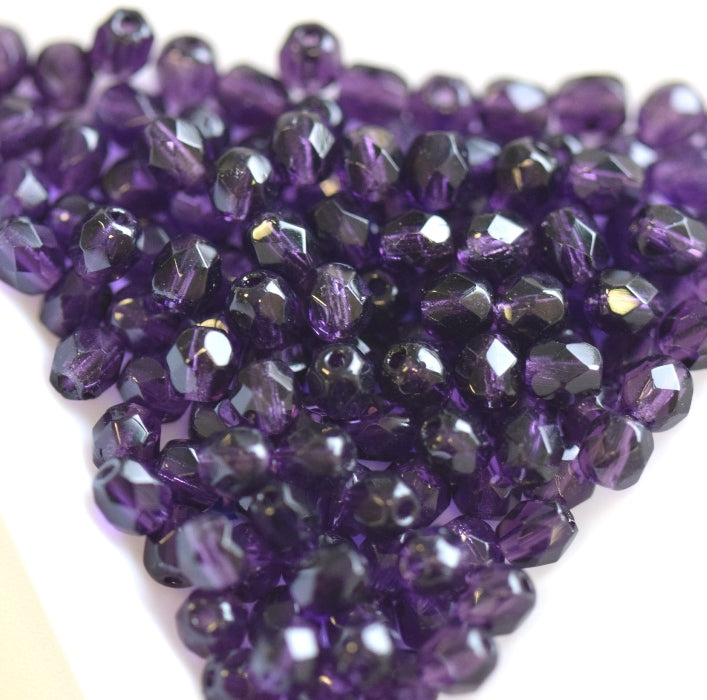 Czech fire-polished beads tanzanite 4mm (100)