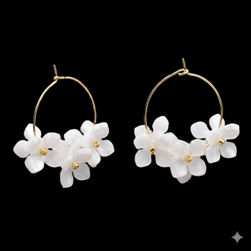 White floral earrings on 25mm golden steel hoops (1 pair)