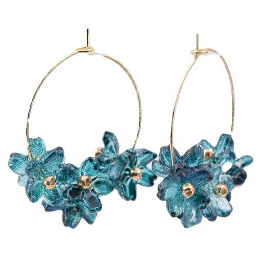 Blue floral earrings on golden steel hoops (1 pair)