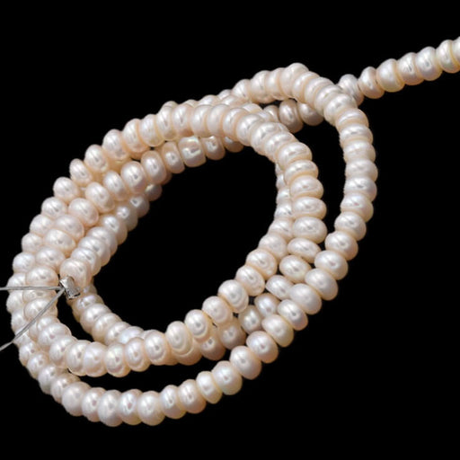 Freshwater pearl round potatoe champagne - 5x4mm - Hole: 0.6mm (1 Strand)
