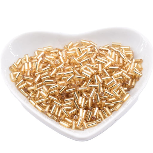 Glass tube bugle beads Light gold lined 4-5x2mm - Hole: 0.8mm (10g)
