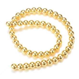 Hematite synthetic golden round bead 4mm - Hole: 1mm (1 Strand-39cm)