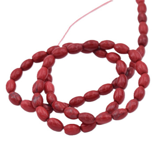 Oval rice bead - red tinted howlite 6x4mm (1 strand - 39cm)