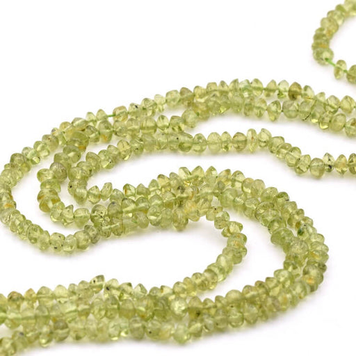 Buy Peridot button bead 4-6x3-5mm - Hole: 0.5mm (1 Strand-33cm)