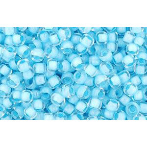 cc976 - Toho beads 11/0 crystal/ neon ice blue lined (10g)