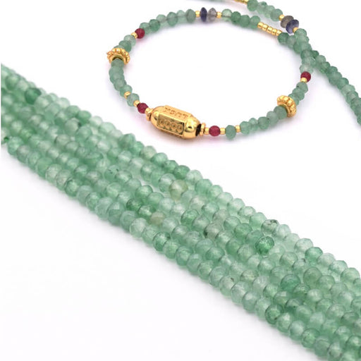 Natural Jade Dyed faceted rondelle light green 4x2,5mm - hole:0,8mm (1 strand)