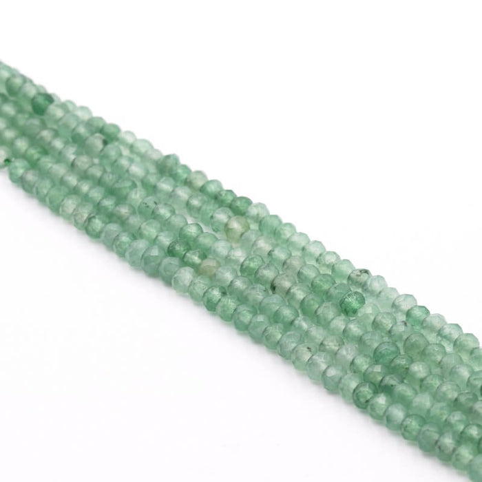 Natural Jade Dyed faceted rondelle light green 4x2,5mm - hole:0,8mm (1 strand)