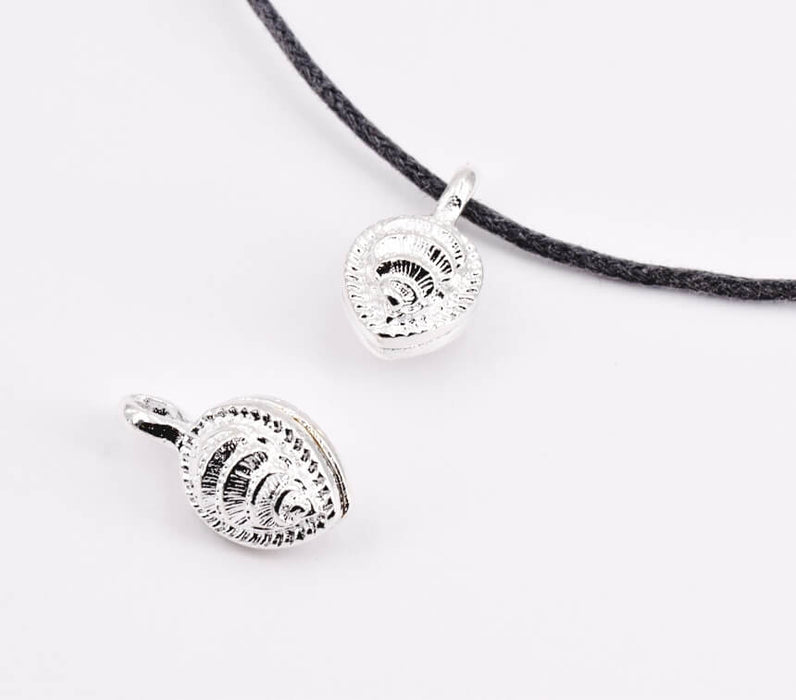 Charm, pendant Grigri Buddhist leaf shape plated silver color 18x11mm (1)