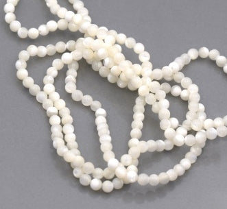 Buy Bead round natural white shell 4mm, hole 0.8mm strand (1)