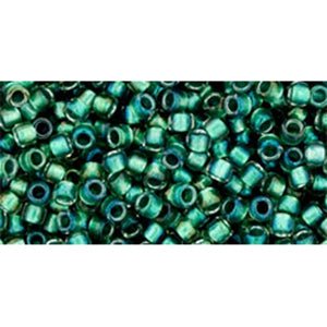 cc264 - Toho Takumi LH round beads 11/0 inside colour rainbow crystal/teal lined (10g)